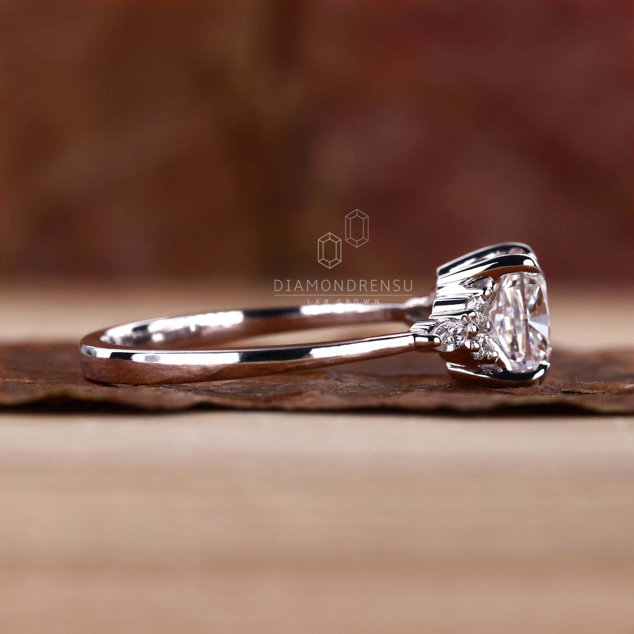 White gold proposal ring featuring a Muse Setting Ring crafted with Lab Grown Diamond and a 4 prong claw setting.