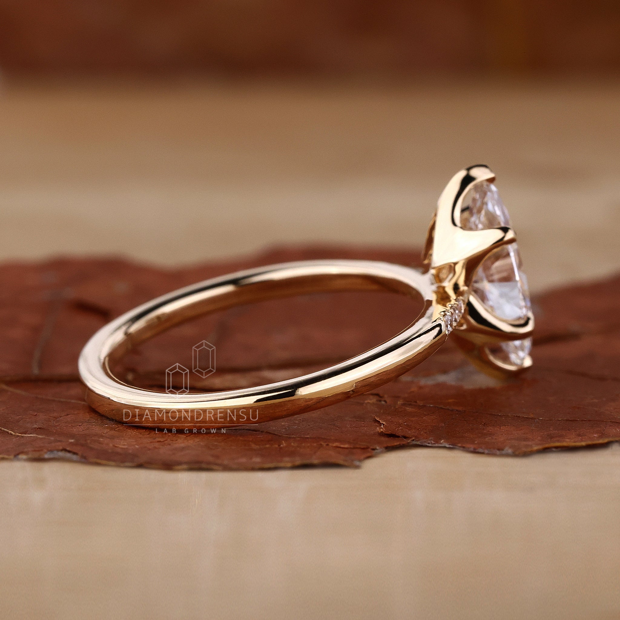 Round cut side stone ring with brilliant sparkle.