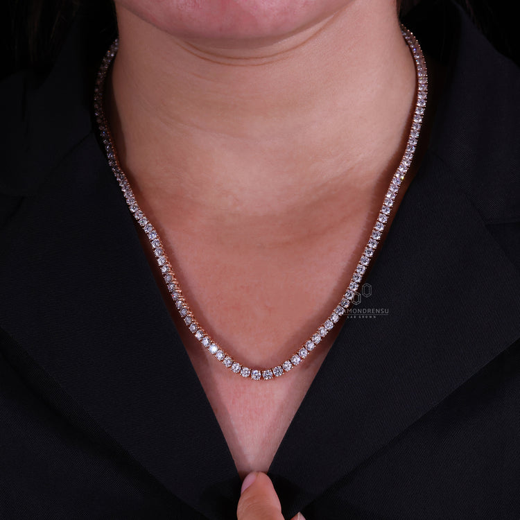 Rose gold necklace featuring round Lab Grown Diamond in a tennis style.