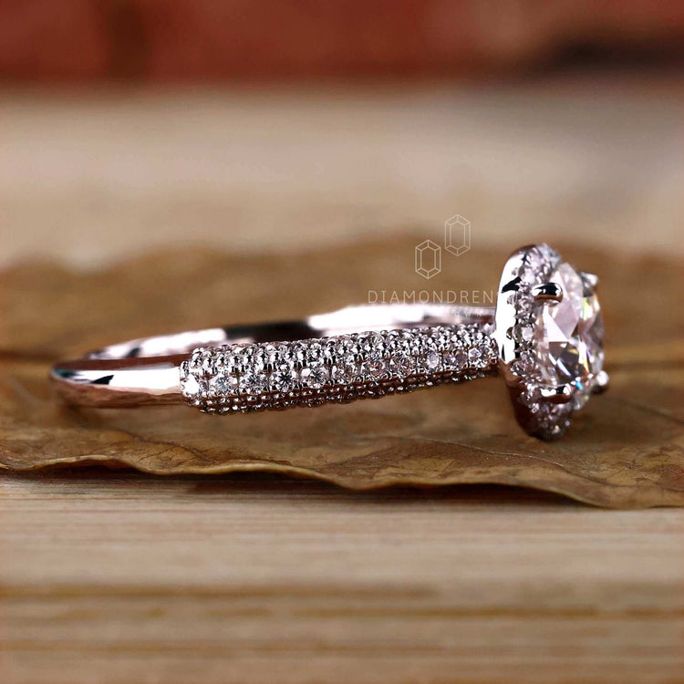 White gold pave diamond ring with prong setting for a timeless look.