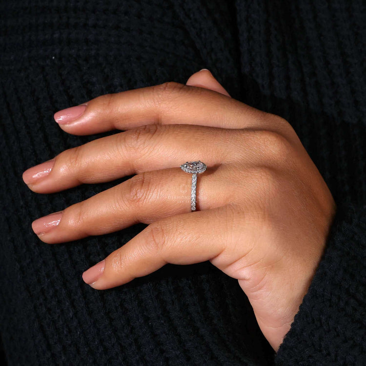 Halo ring with pave ring accents, making it an elegant engagement ring with pave details for women.