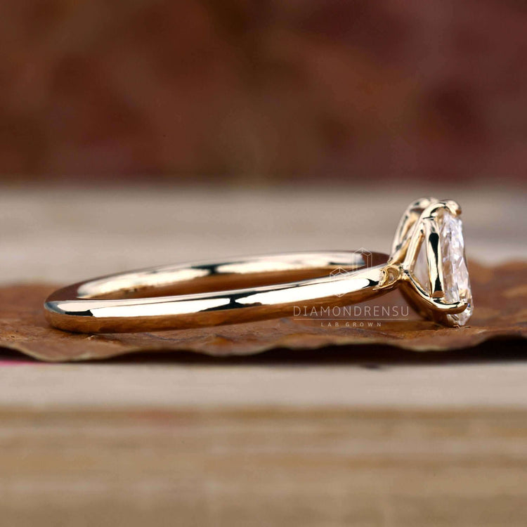 Pear Cut Diamond and Emerald Cut Diamond toi et moi ring designed for elegant engagement ring for women in the UK.