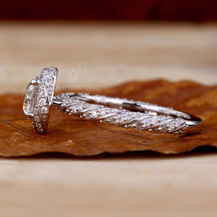 Modern twisted pave ring for a sophisticated statement.