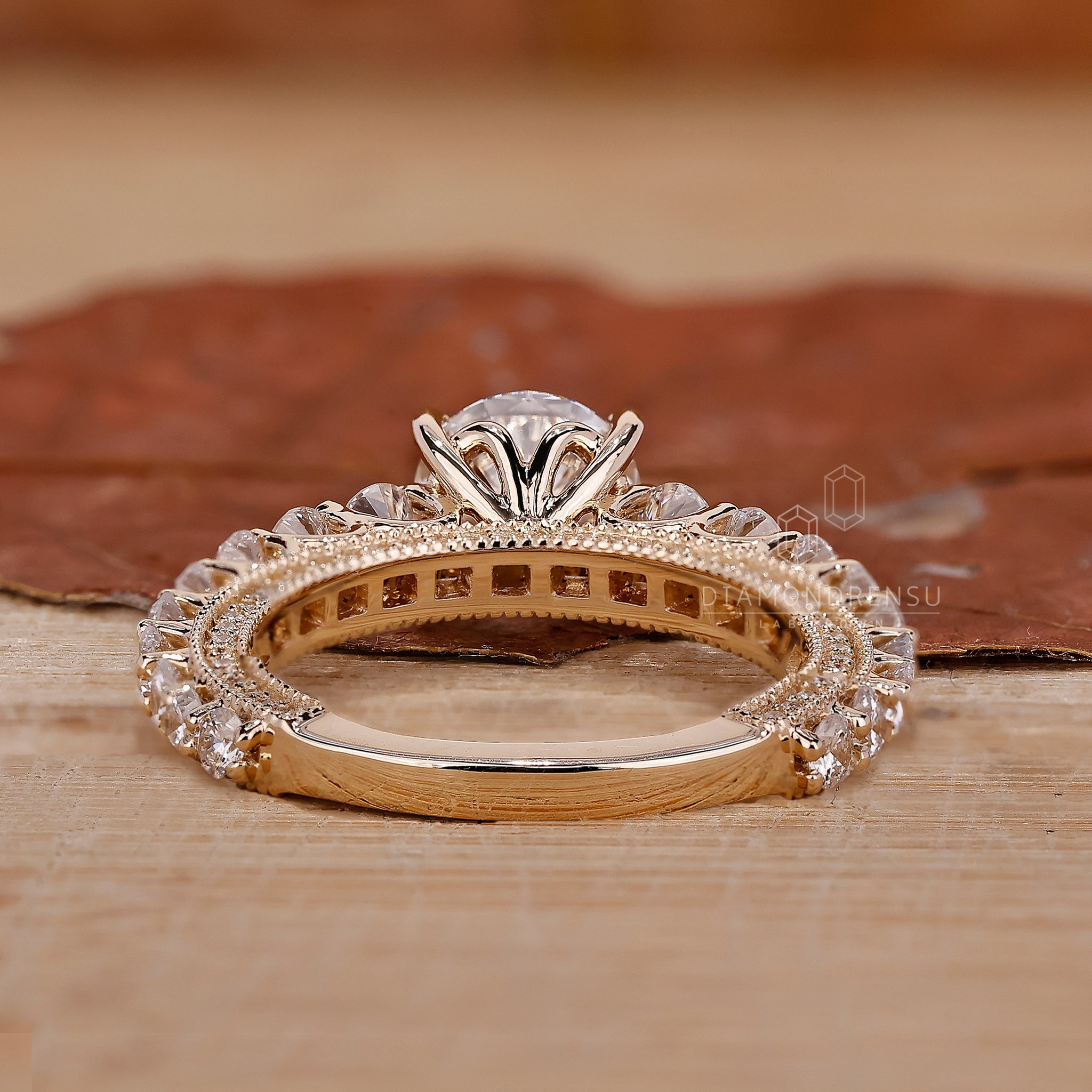 Diamondrensu UK ring with round cut diamond and prong setting.