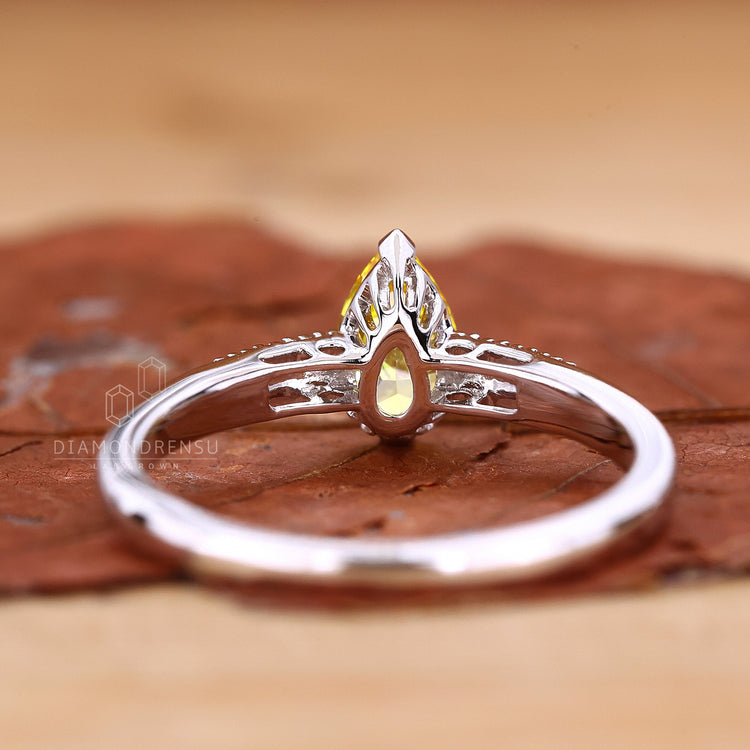 Buy engagement ring with pear diamond engagement ring.