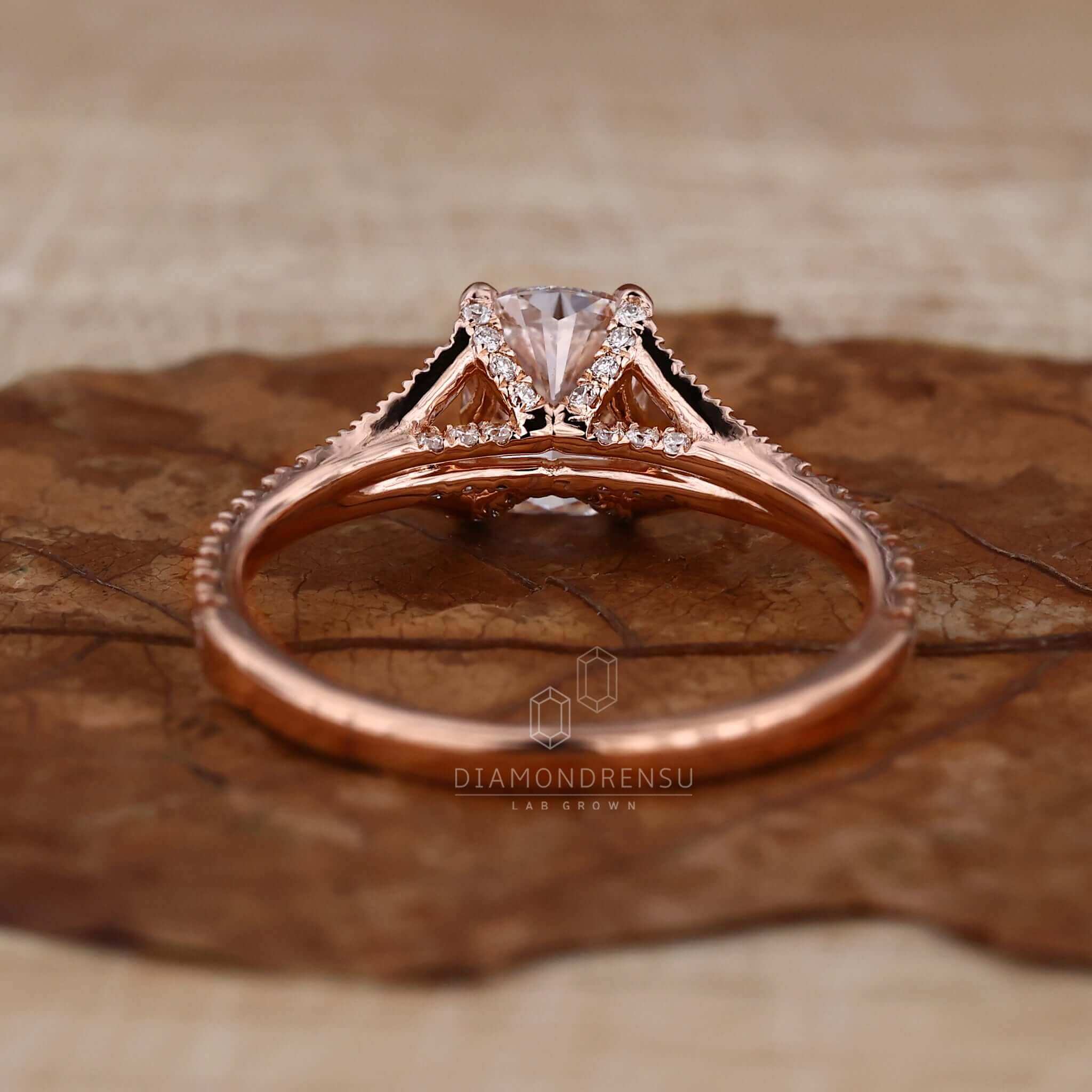 Cathedral setting with an elongated cushion cut diamond in an igi certified lab grown diamond ring.