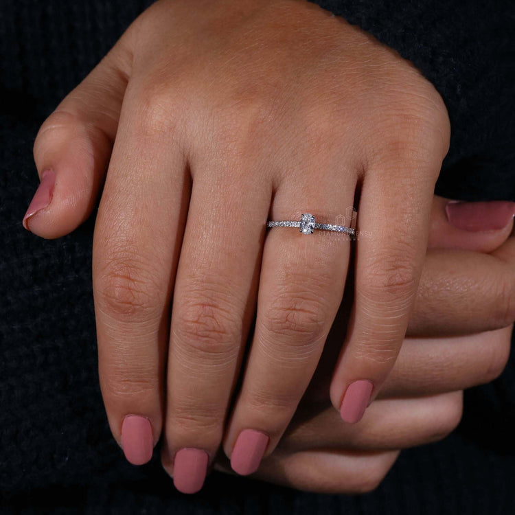 Oval diamond crafted in a hidden halo engagement ring, a perfect choice for unique engagement ring designs.