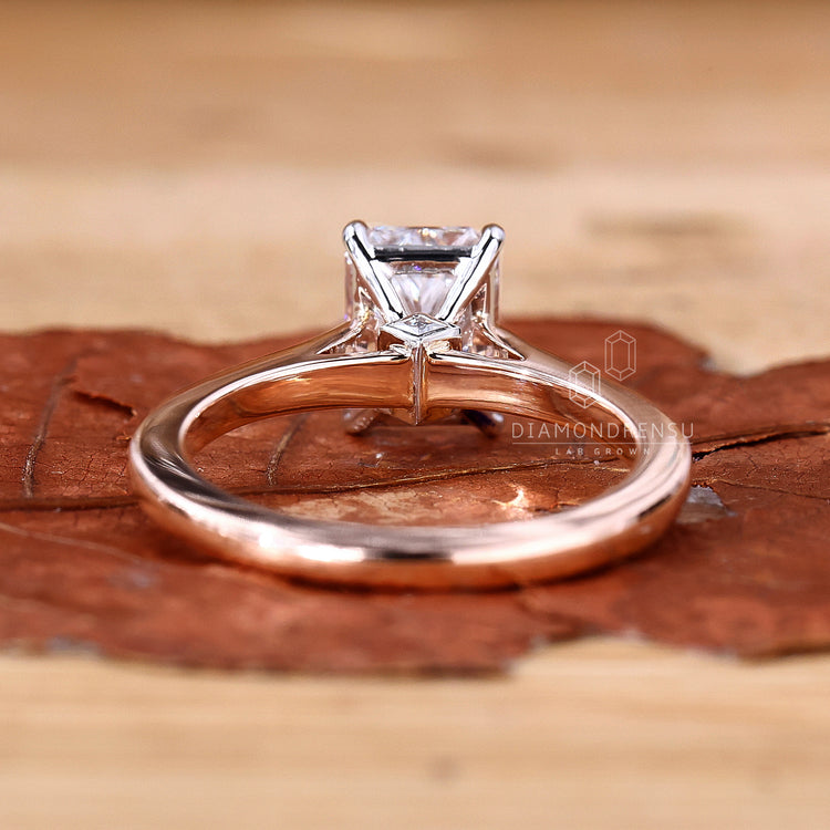Peekaboo ring with hidden princess cut accent.