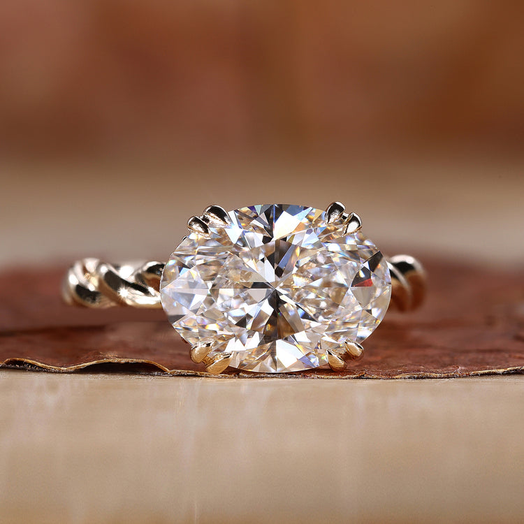 Oval Diamond Engagement Ring with round diamond ring