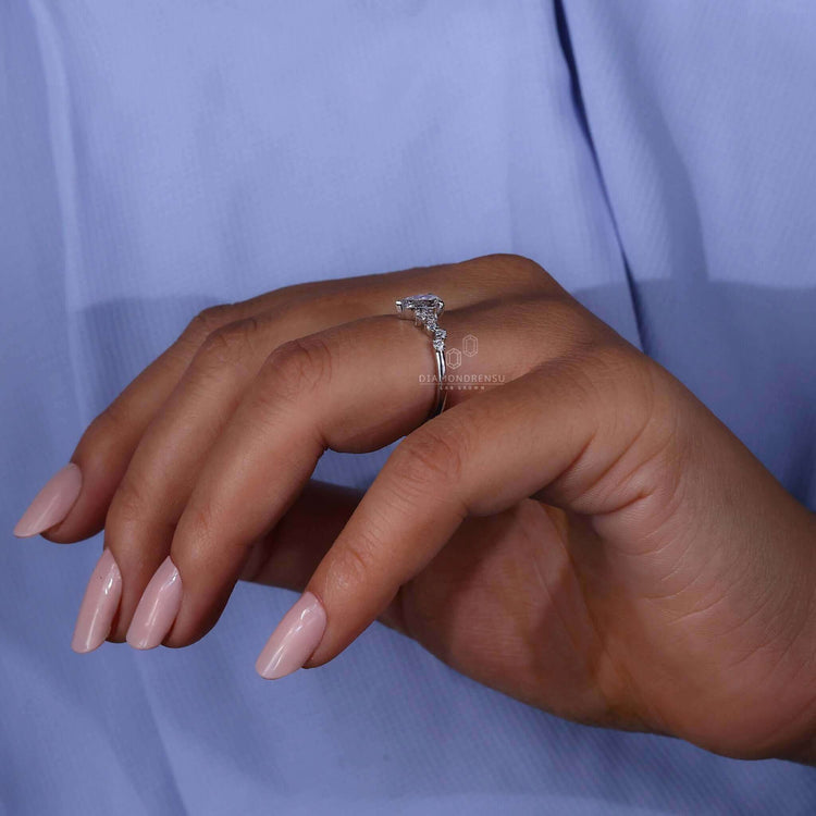 Zig Zag Pave Engagement Ring with pear cut diamond and handmade craftsmanship for a one-of-a-kind design.