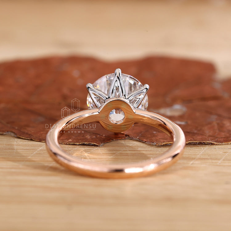 Rose and white gold ring with old european cut diamond engagement ring