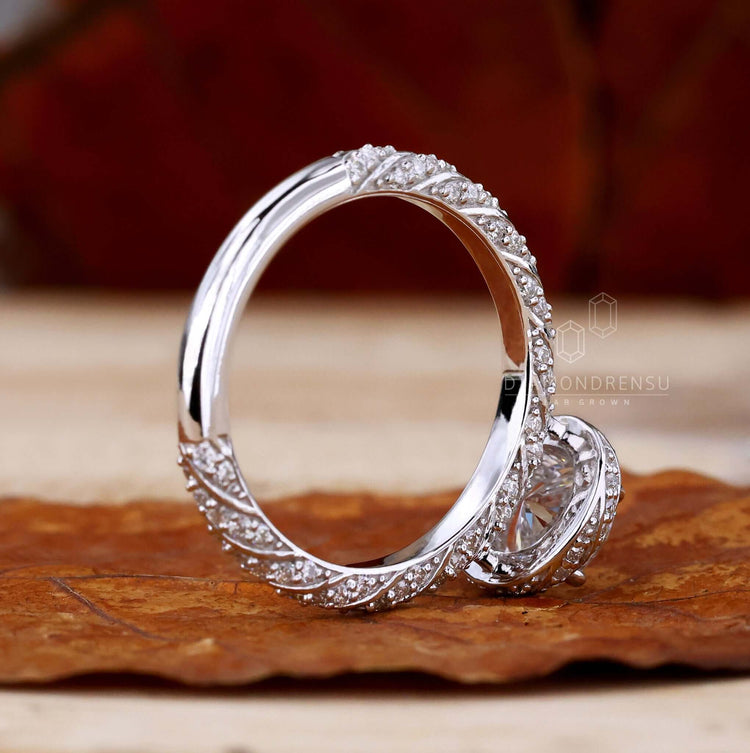 Unique round cut engagement ring with brilliant sparkle.