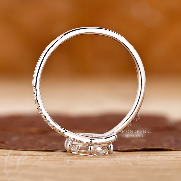 Handmade radiant cut ring with leaf-inspired prongs