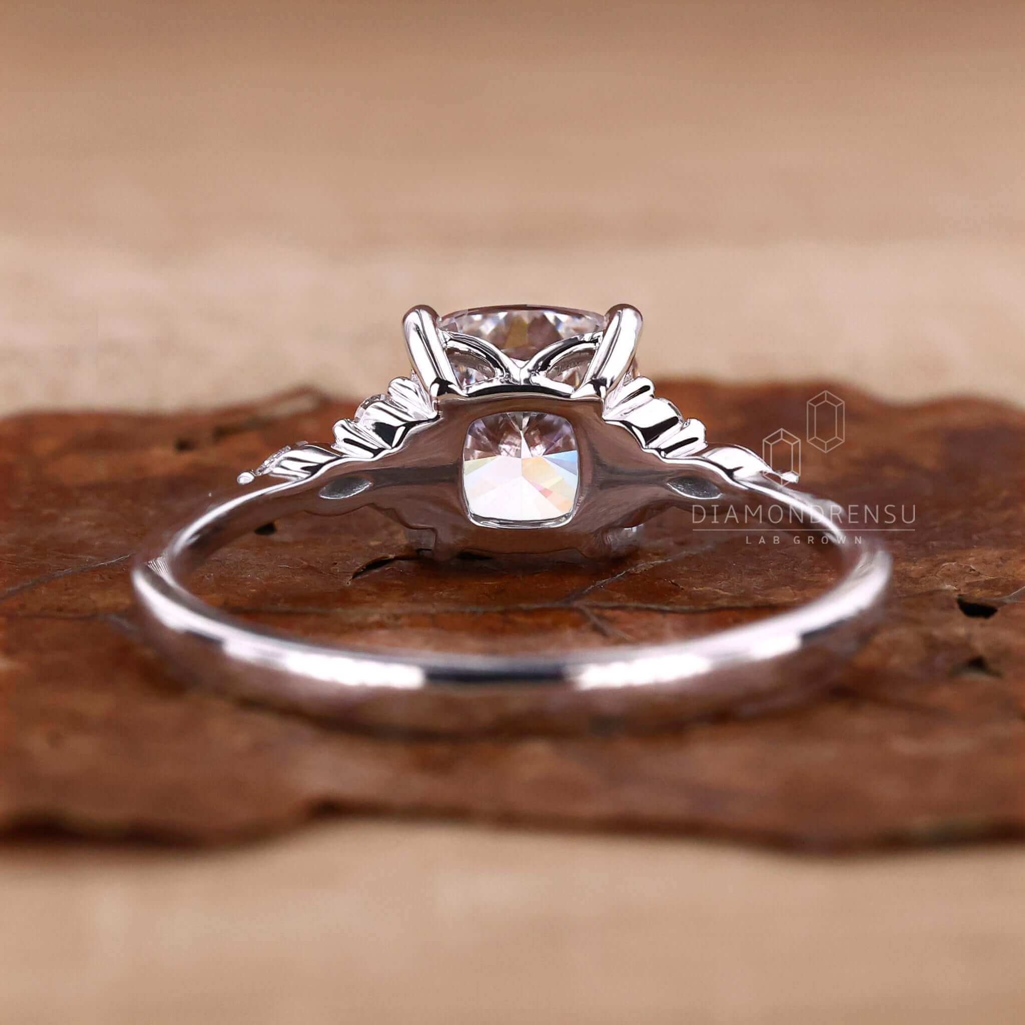 Cushion cut engagement ring in minimalist style, designed with Lab Grown Diamond and igi certified craftsmanship.