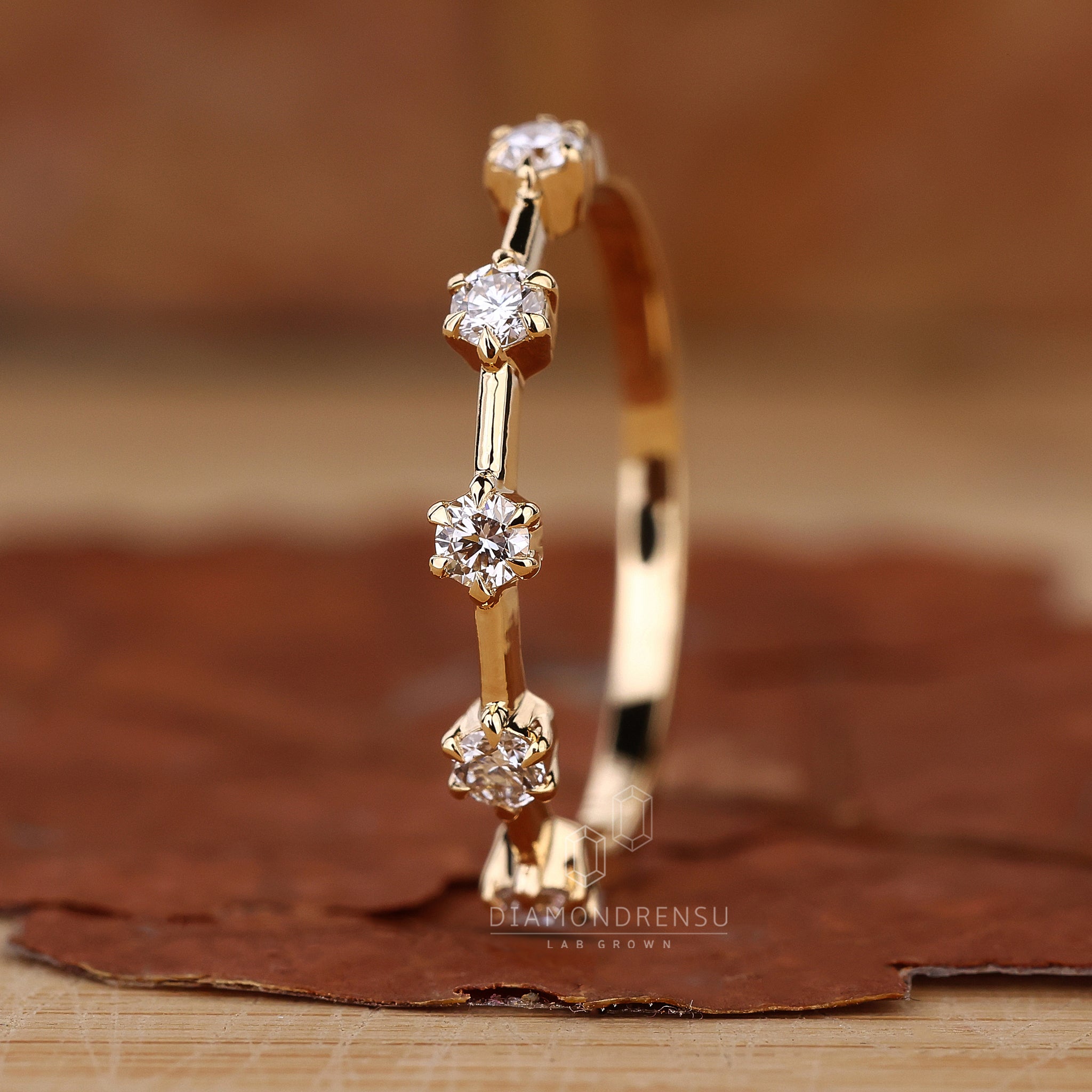 UK wedding band with lab grown round diamonds