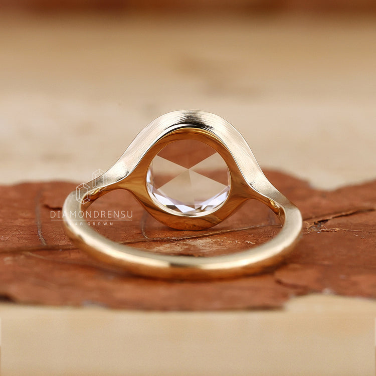 Yellow gold engagement ring with rose cut.