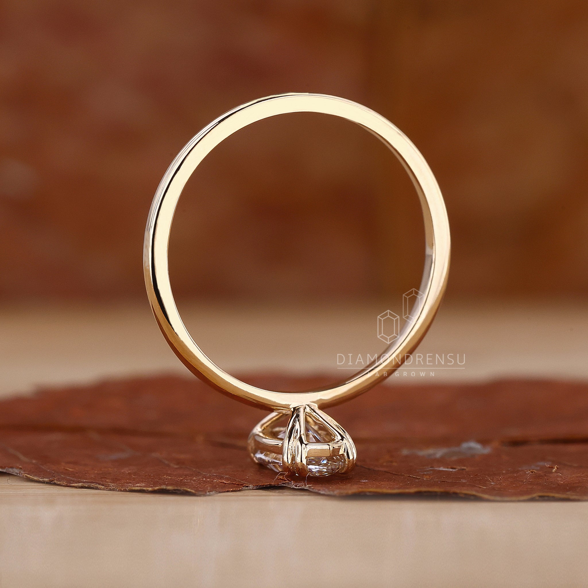Diamondrensu UK engagement ring styled as marquise diamond ring