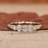 Oval diamond wedding band in yellow gold.