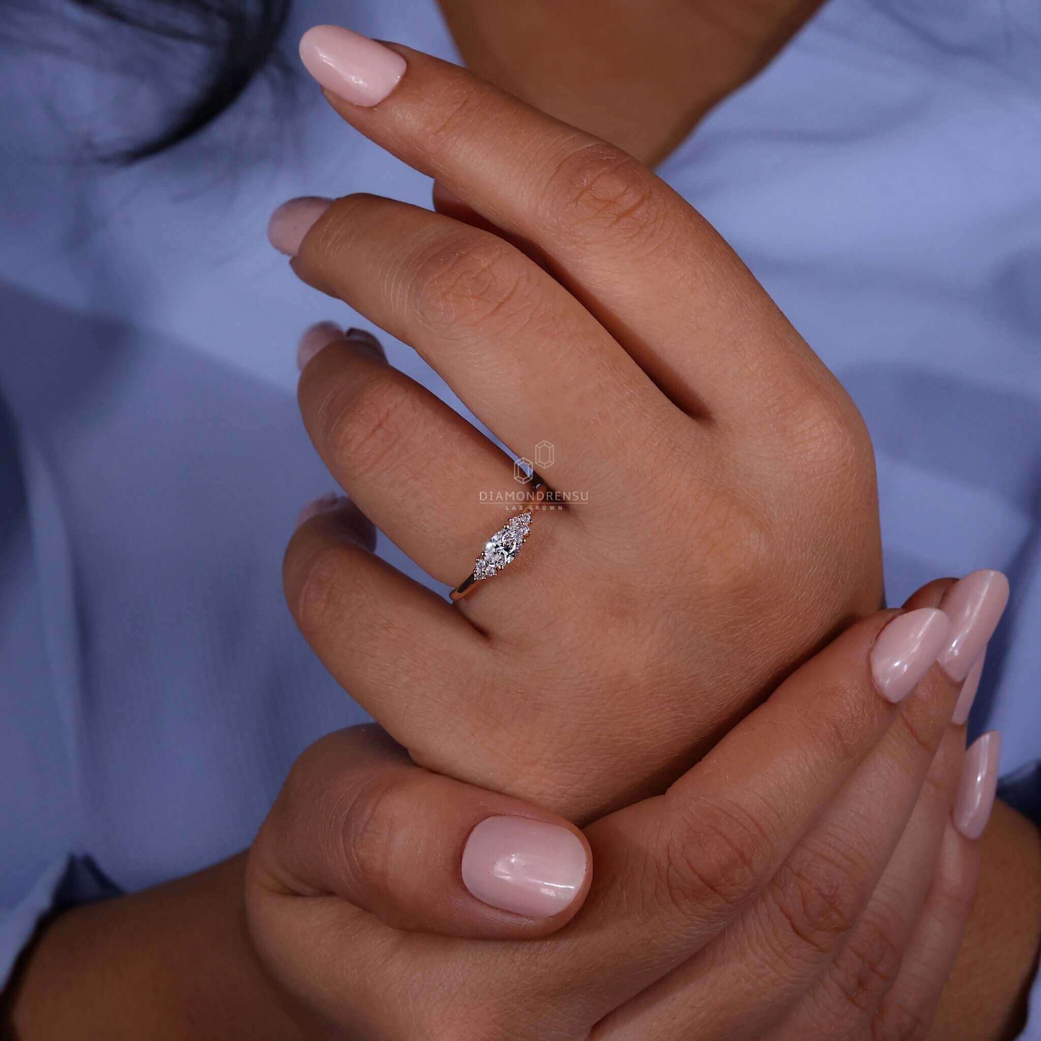 Sleek oval shaped diamond ring with a muse-inspired design for everyday elegance.