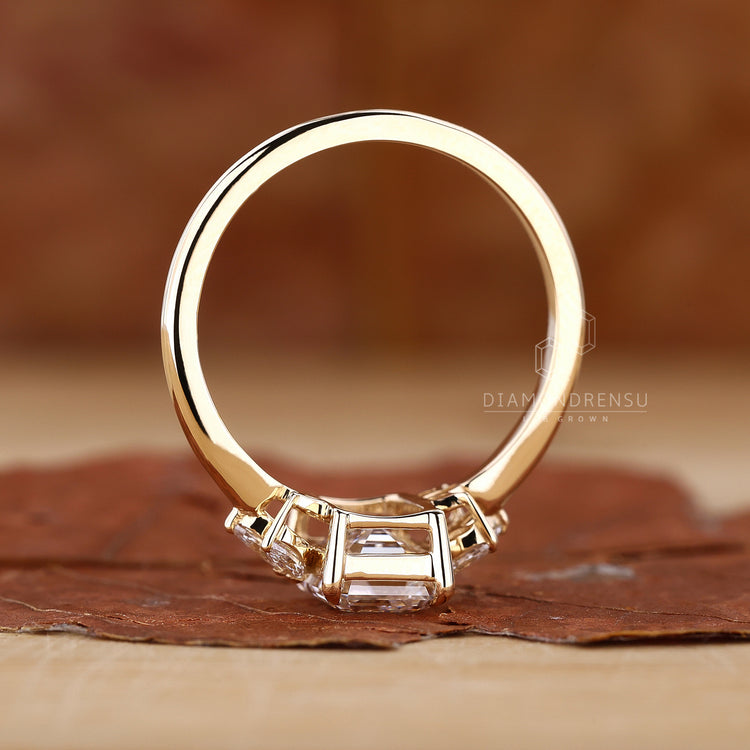 Custom engagement ring with marquise diamonds.