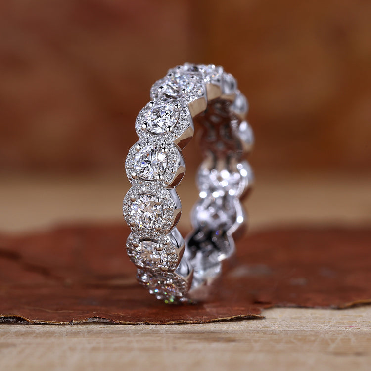 Halo wedding band with round cut diamonds in white gold