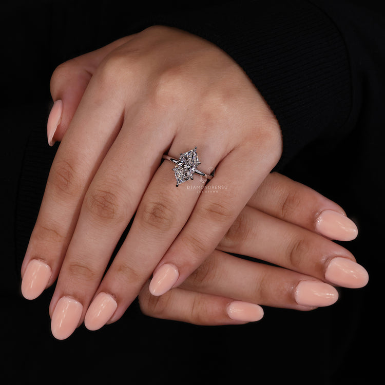 6 claw prong setting with round cut hidden halo.