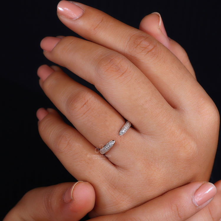 Round cut diamond pave band in yellow gold.