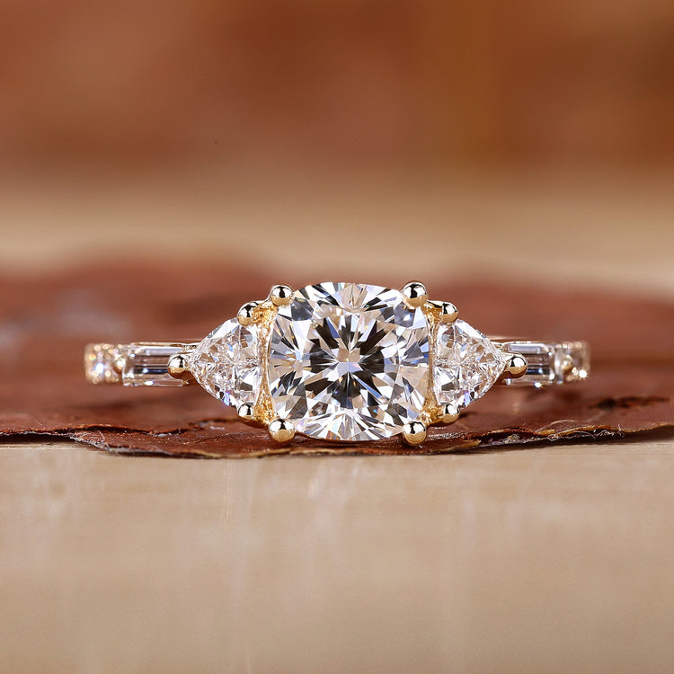 3 stone engagement ring with cushion cut diamond ring.