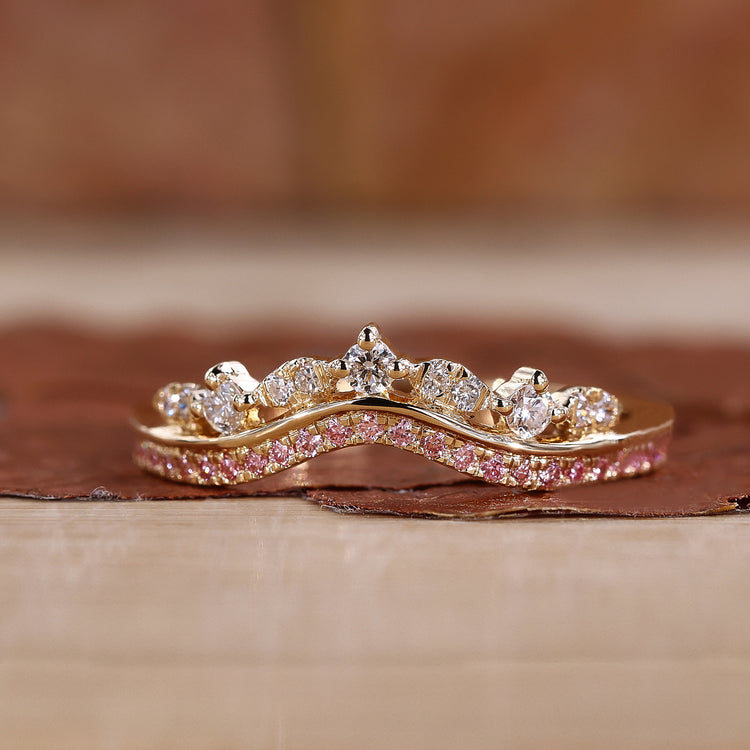 Pink and diamond crown wedding band in white gold.