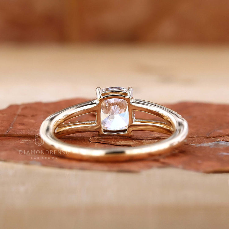 Diamond Split Shank Engagement Ring featuring a stunning centre stone, surrounded by elegant diamond detailing.