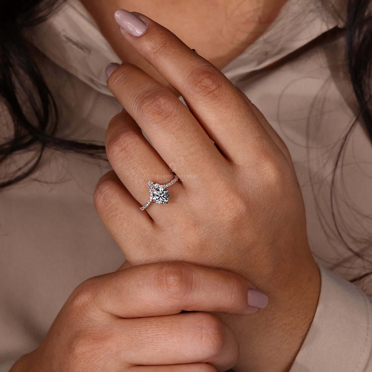 Pear shaped ring diamond set in a rose gold engagement ring for a modern yet classic look.