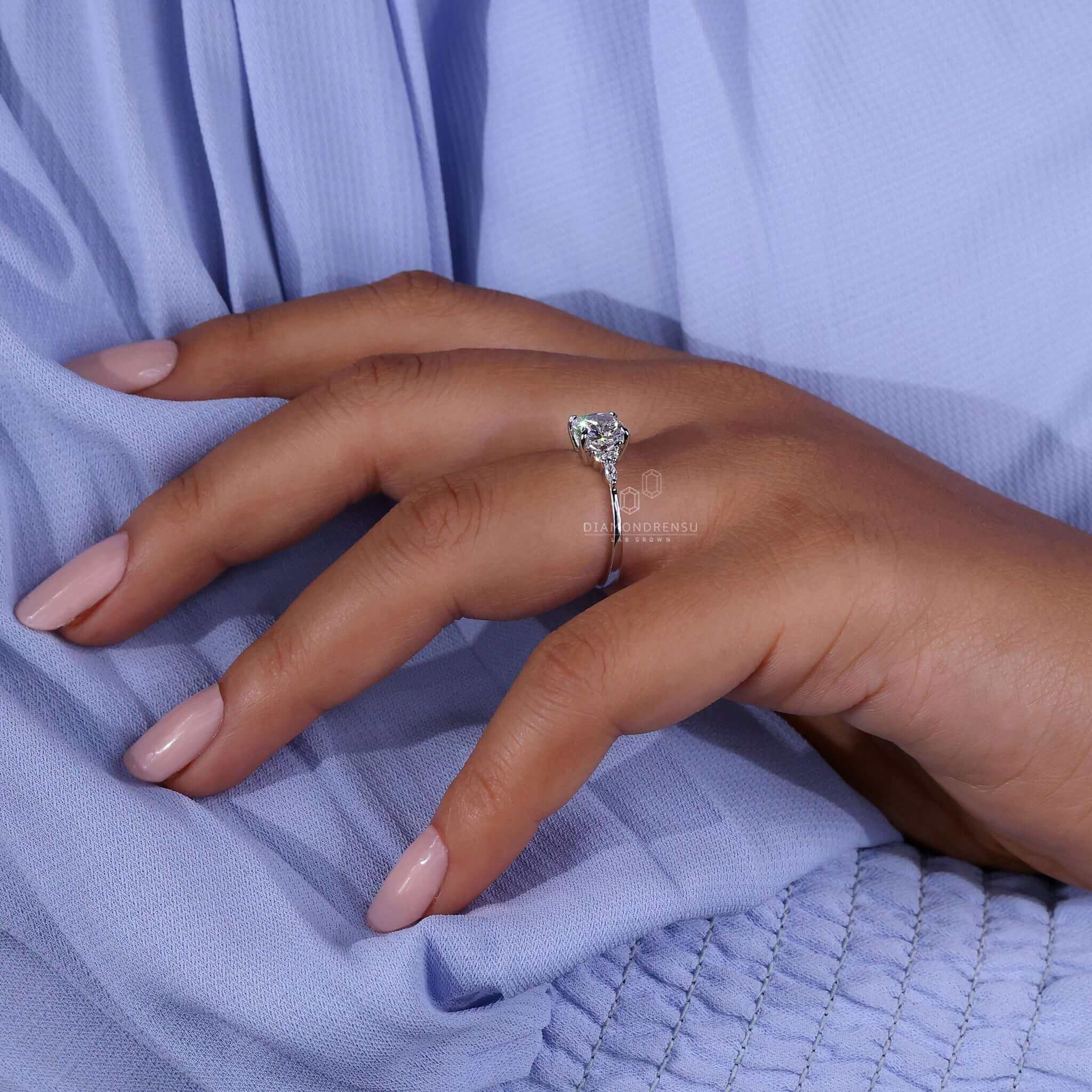 Cushion shape diamond set in a white gold ring, ideal for a classic yet unique engagement ring style.