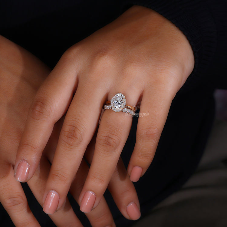 Oval engagement ring and diamond band.