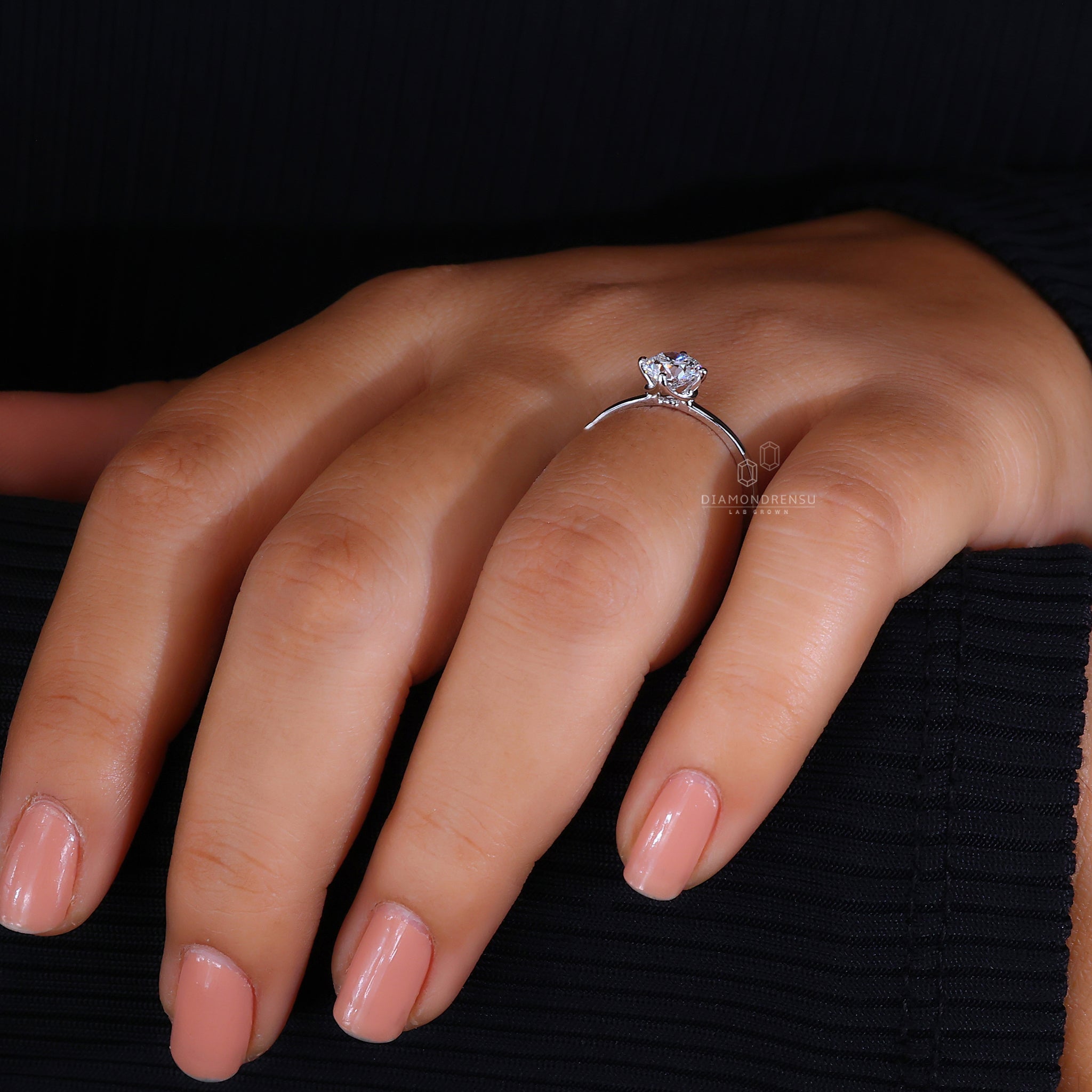Round cut diamond solitaire ring design.