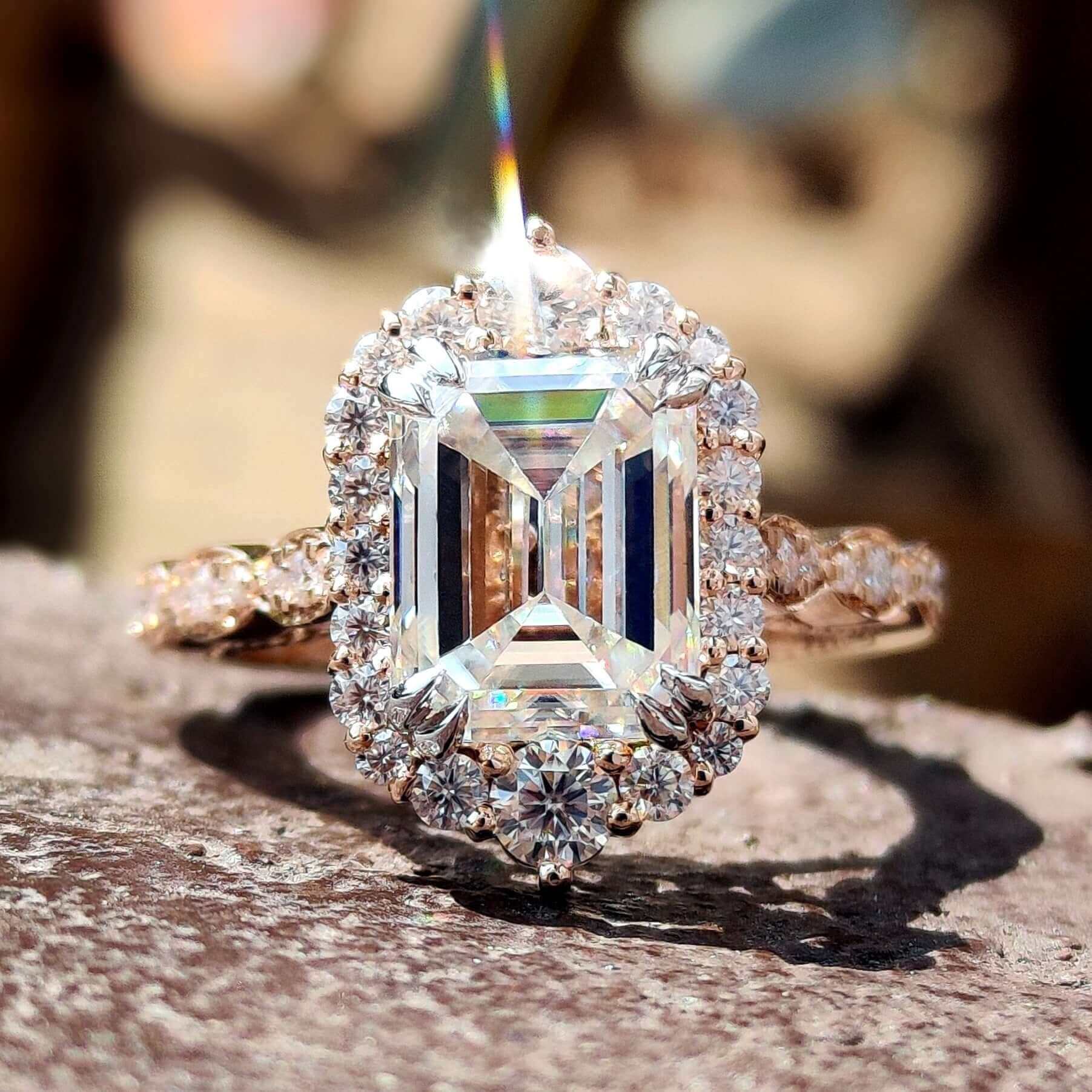 Emerald cut moissanite ring with vintage style.