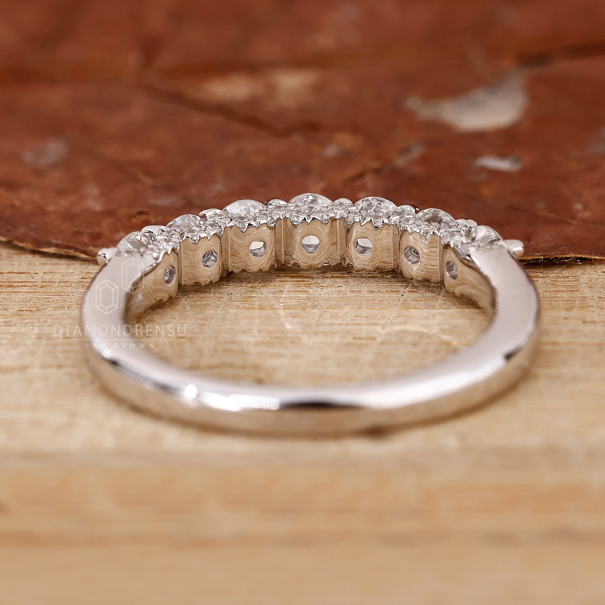 Elegant hidden pave diamond wedding ring.