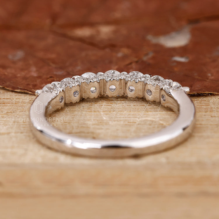 Elegant hidden pave diamond wedding ring.