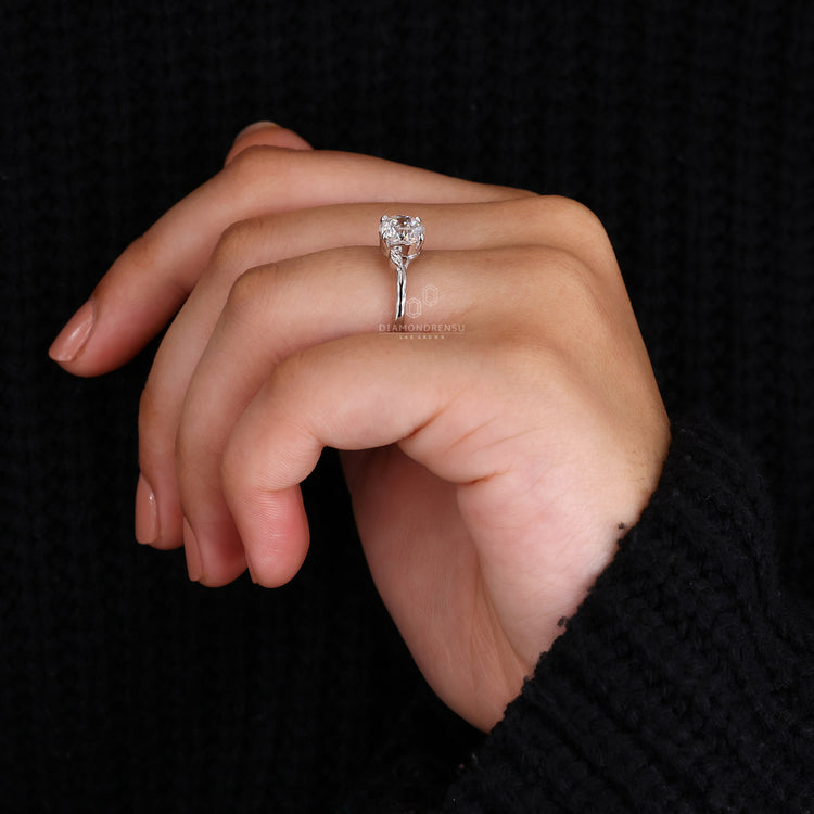Unique engagement ring styled as Portuguese cut diamond ring.