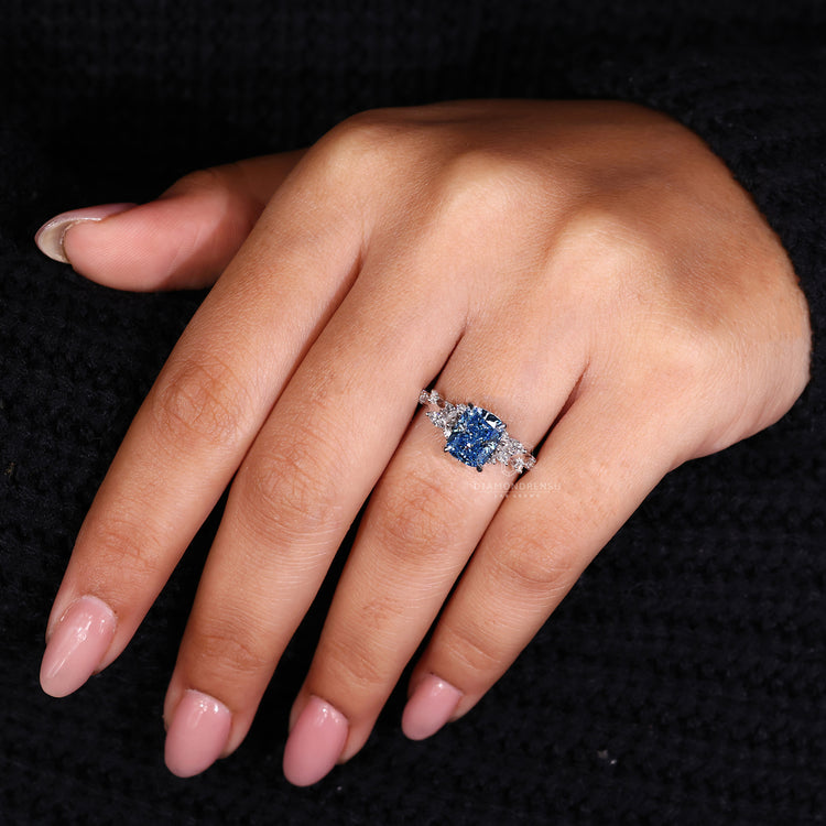 IGI certified engagement ring with cushion diamond and handmade details.