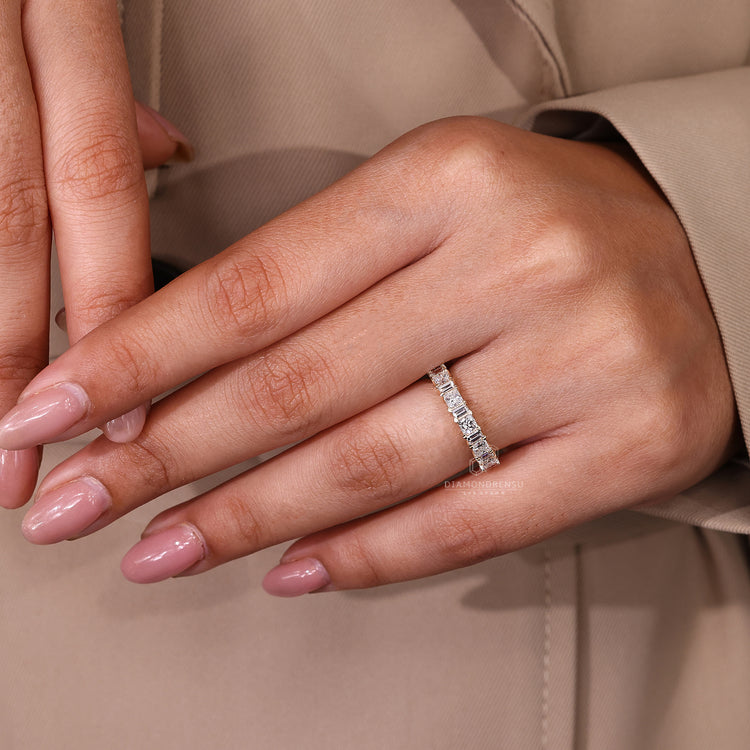 Simple diamond band with alternating princess and baguette cuts.