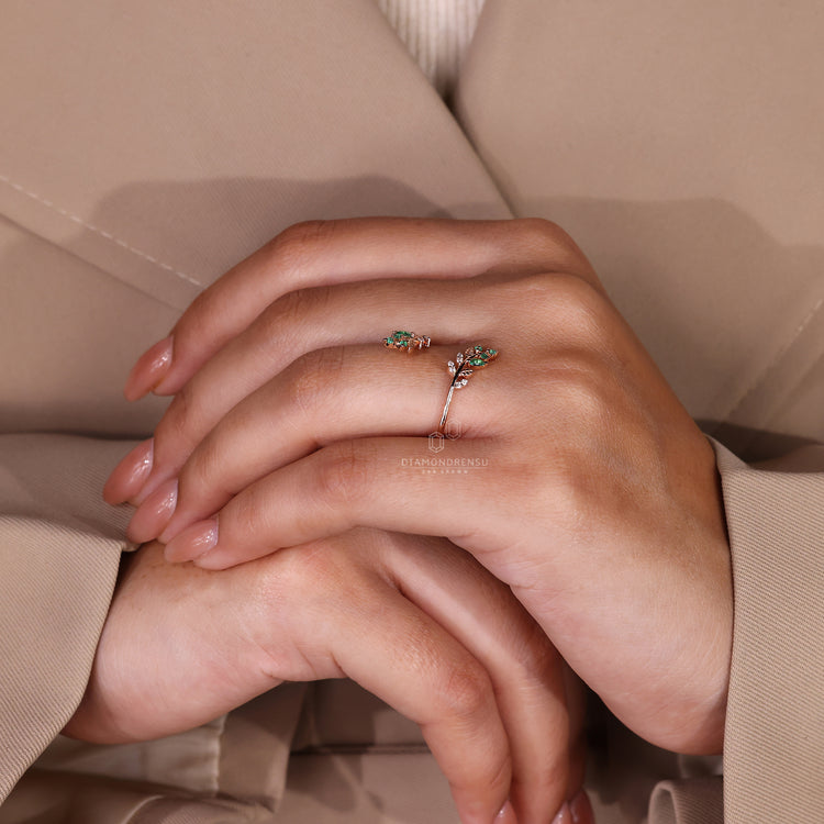 Nature inspired wedding band featuring leaf details and lab grown diamonds.