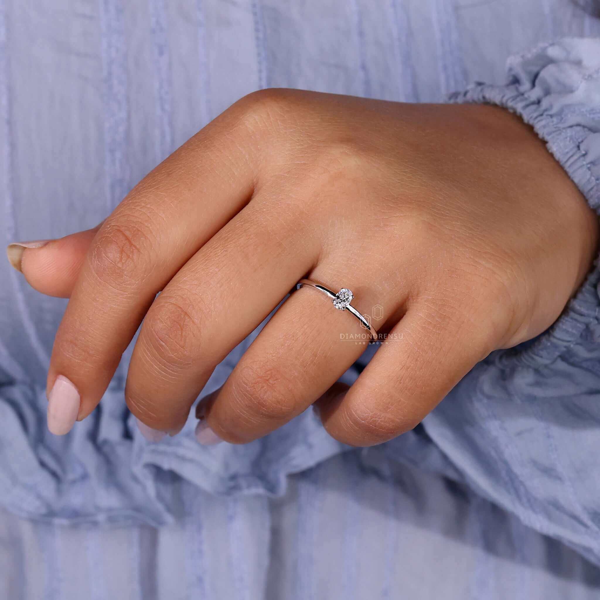 2 carat oval diamond ring with a 4 prong engagement ring design, ideal for a unique engagement ring experience.