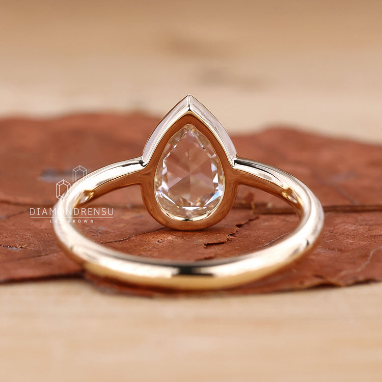 UK engagement ring with rose cut diamond detail
