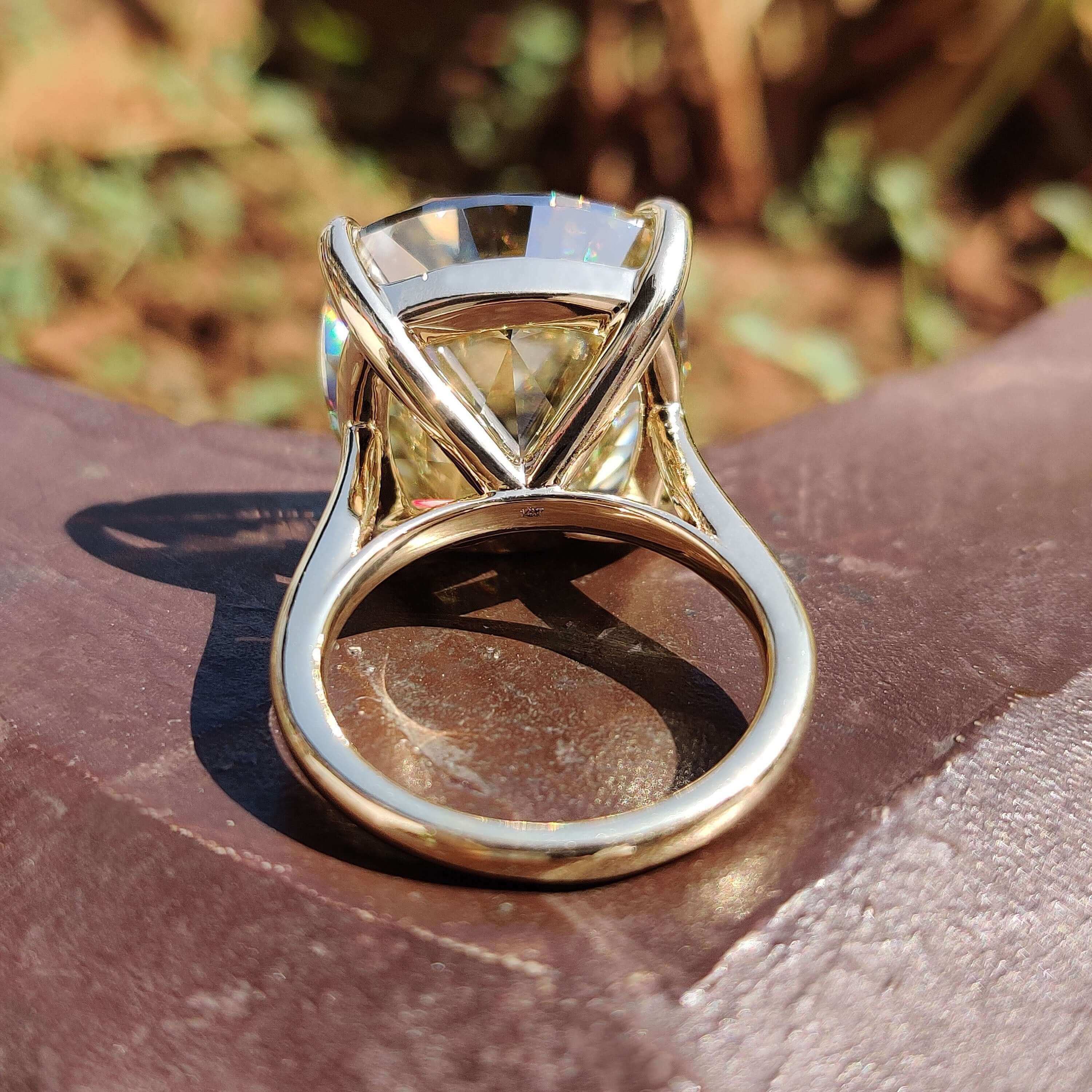 4 claw prong ring with cushion moissanite.