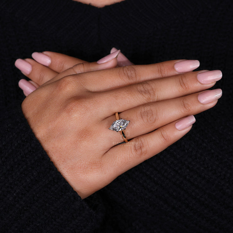 Prong Setting Ring with secure and elegant diamond placement.
