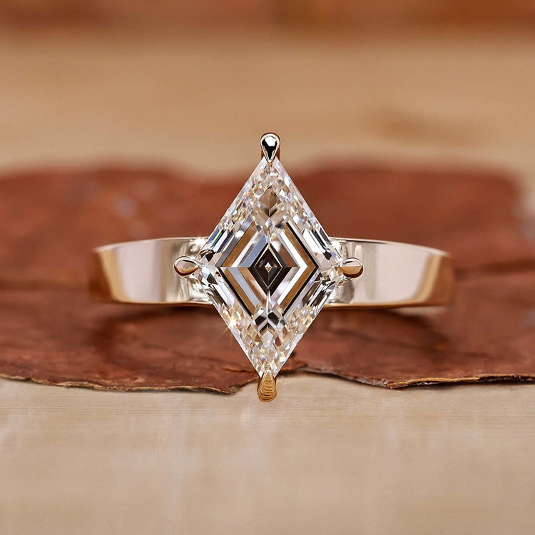 Gold Solitaire Engagement Ring with a stunning diamond centre.