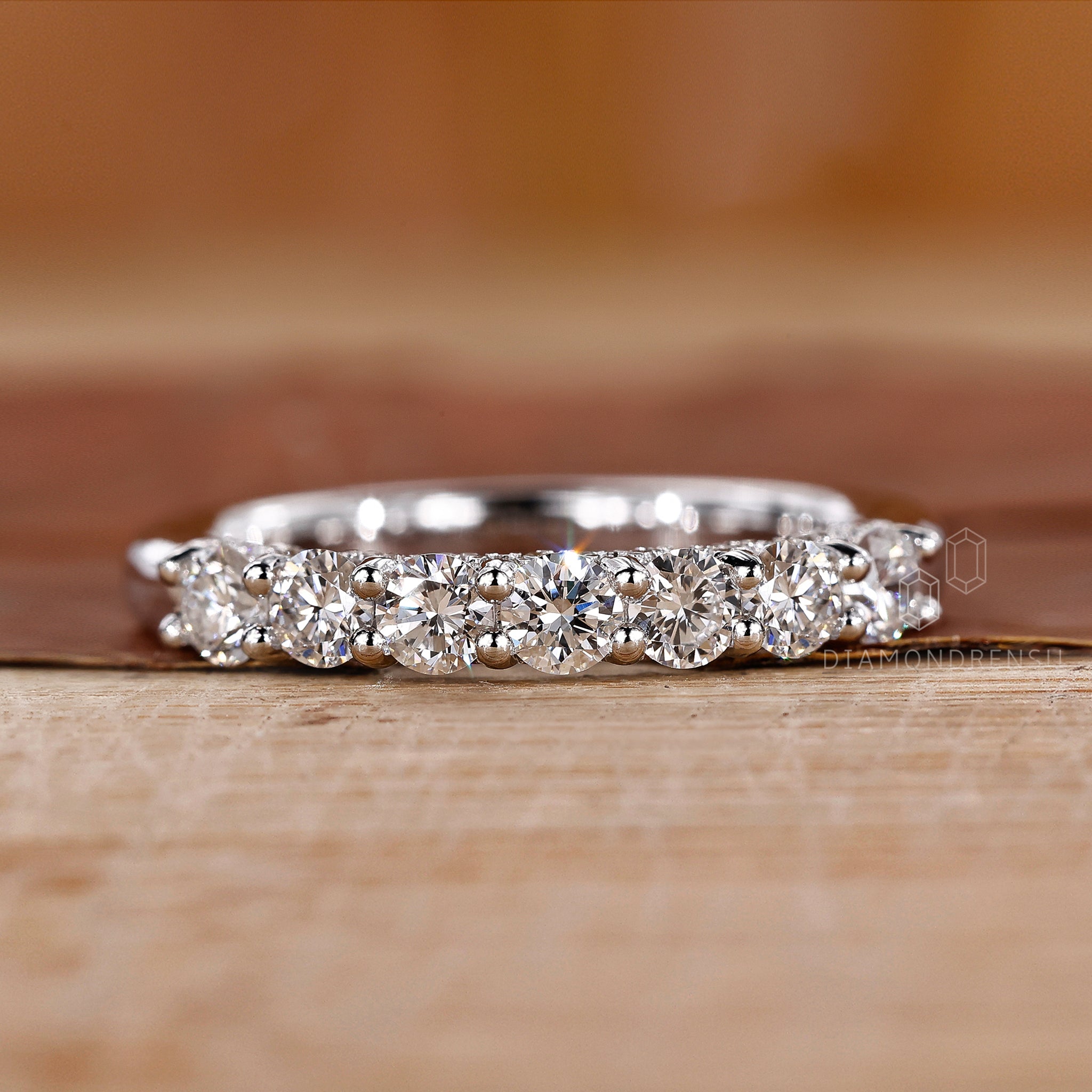 Lab diamond half eternity ring with hidden setting.