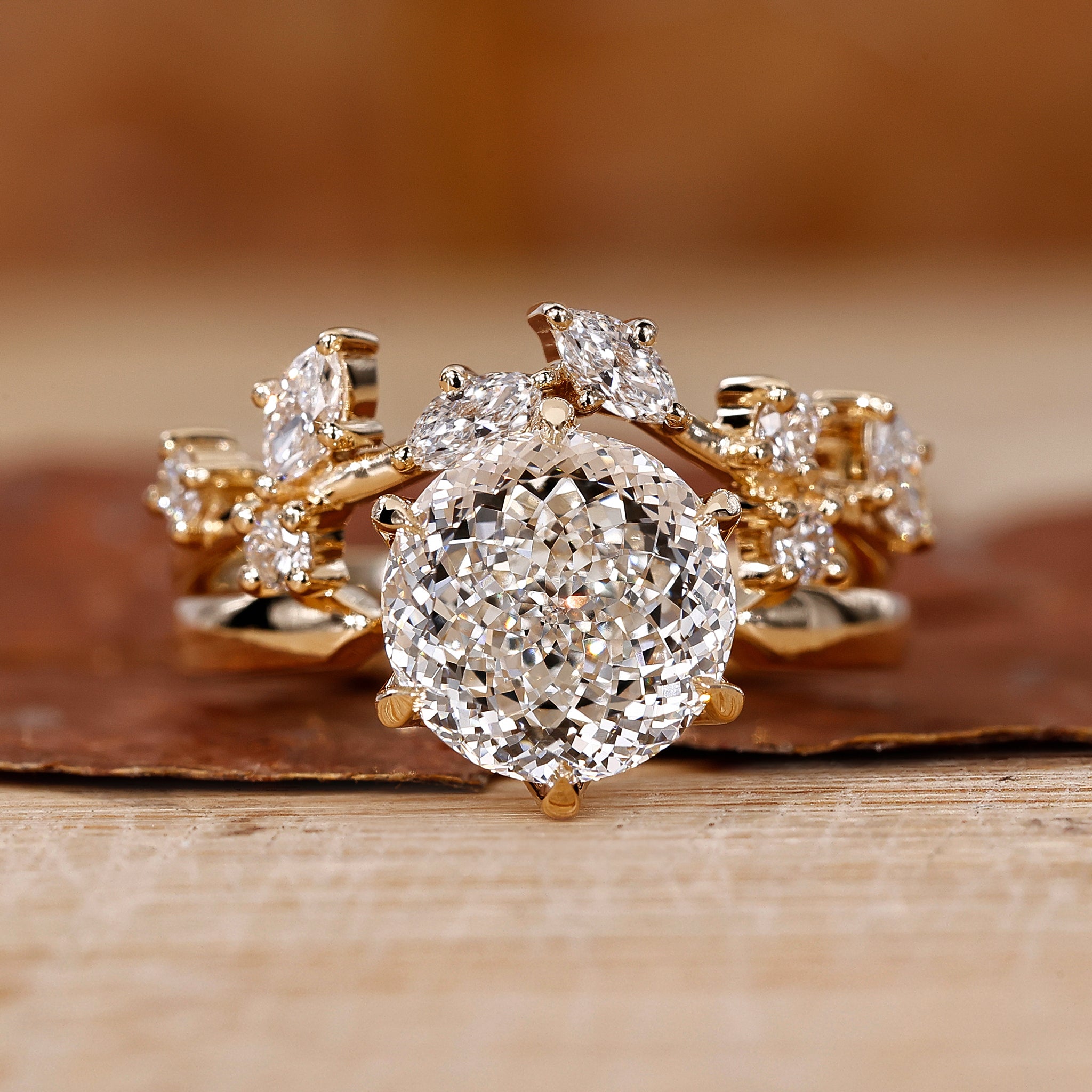 Solitaire engagement ring with wedding band in a yellow gold bridal set.