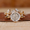 Solitaire engagement ring with wedding band in a yellow gold bridal set.