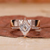 Pave engagement ring paired with a plain wedding band in rose gold.